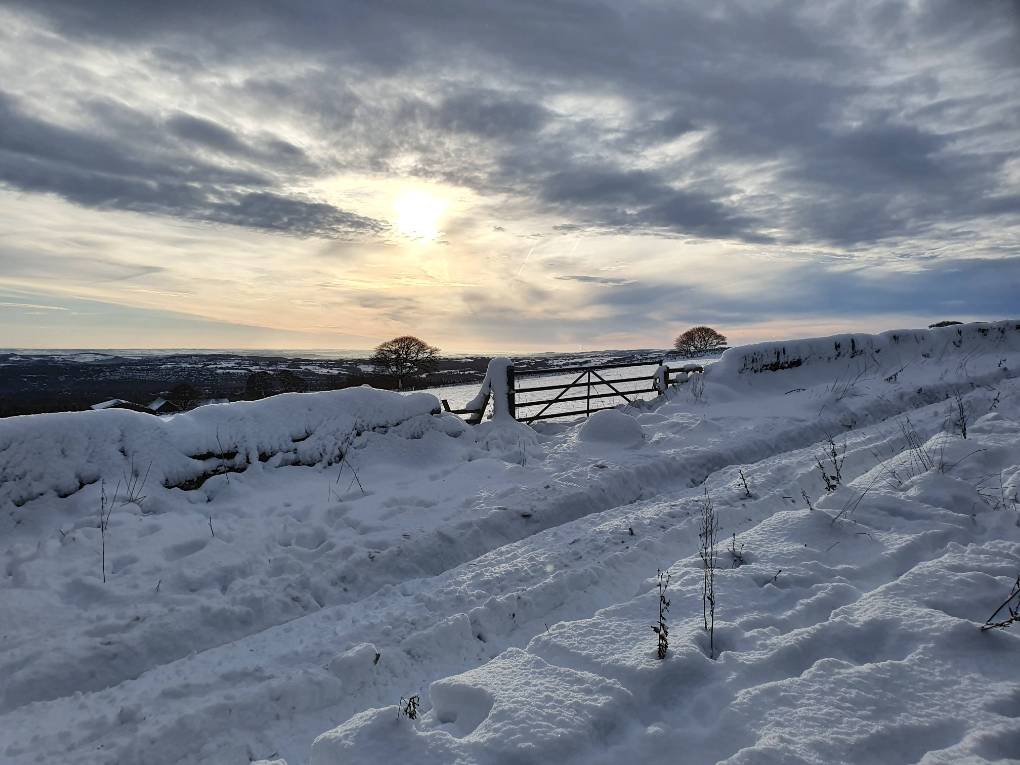 Snowy walk in West Sheffield overlooking the Peaks. Posted by rupertwilson20