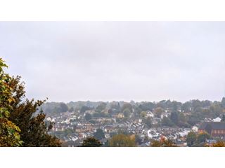 Rain turning heavy from the southwest