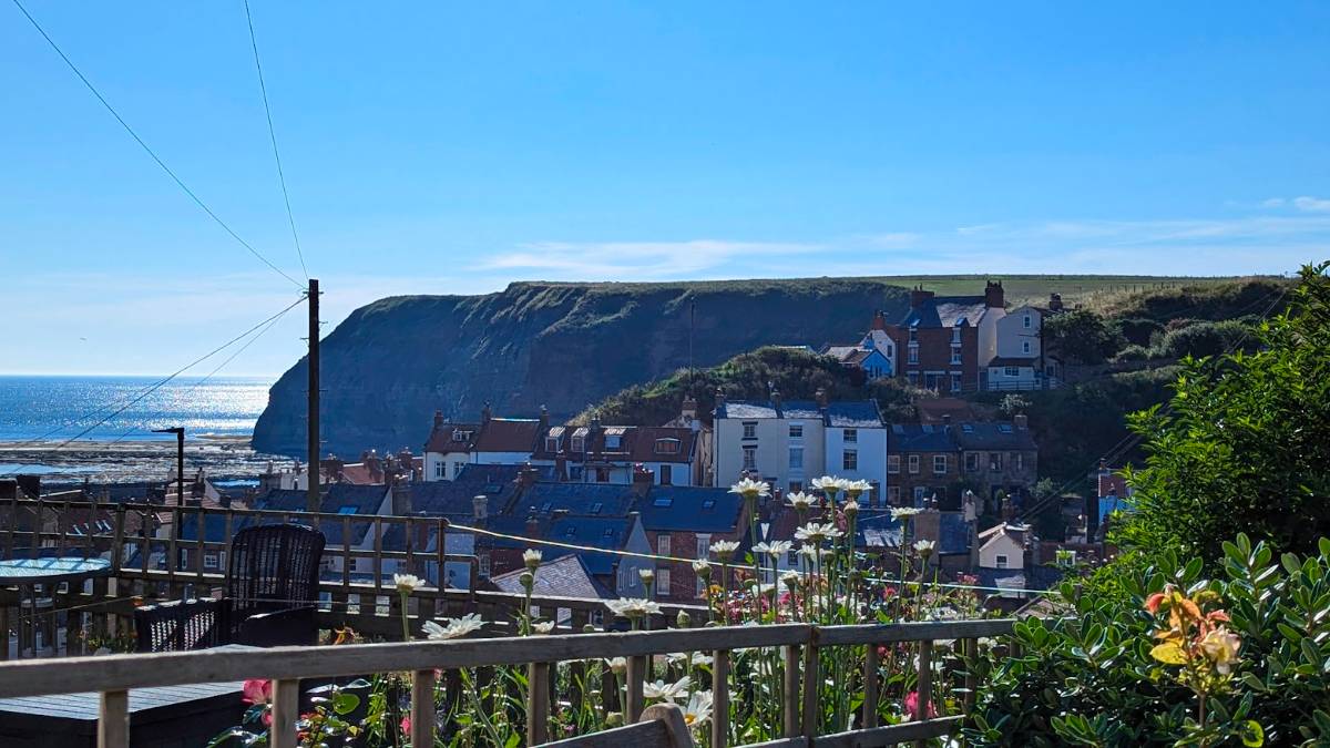 Staithes, North Yorkshire. A fine and very warm July day. Posted by Brian Gaze